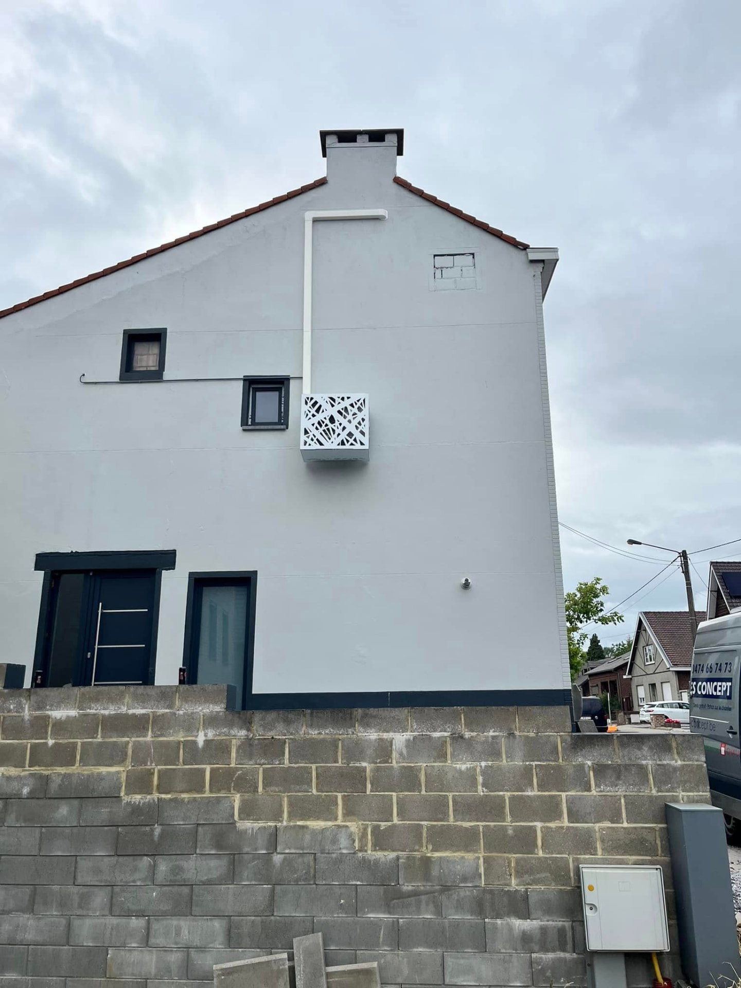 Sortie de ventilation en façade d'une maison rénovée par Energies Concept à Morlanwelz